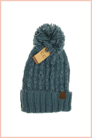 BEANIE WITH POM POM TOP