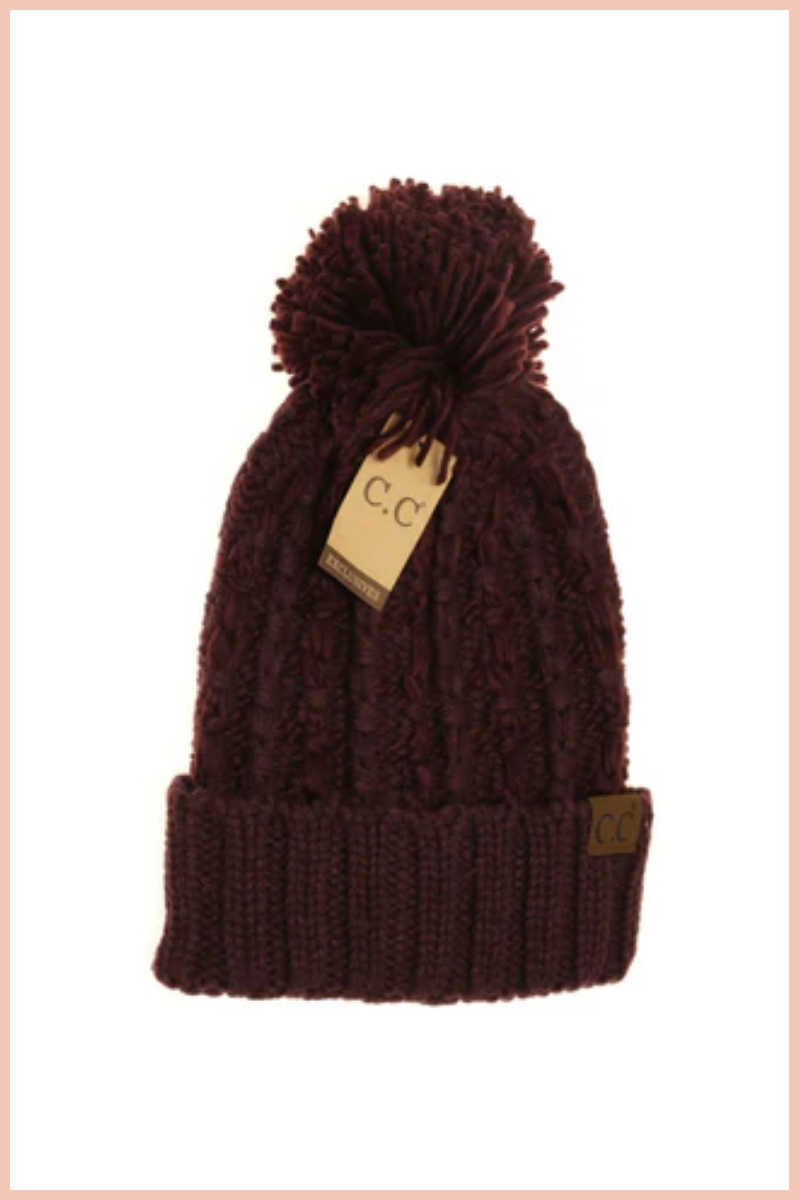 BEANIE WITH POM POM TOP